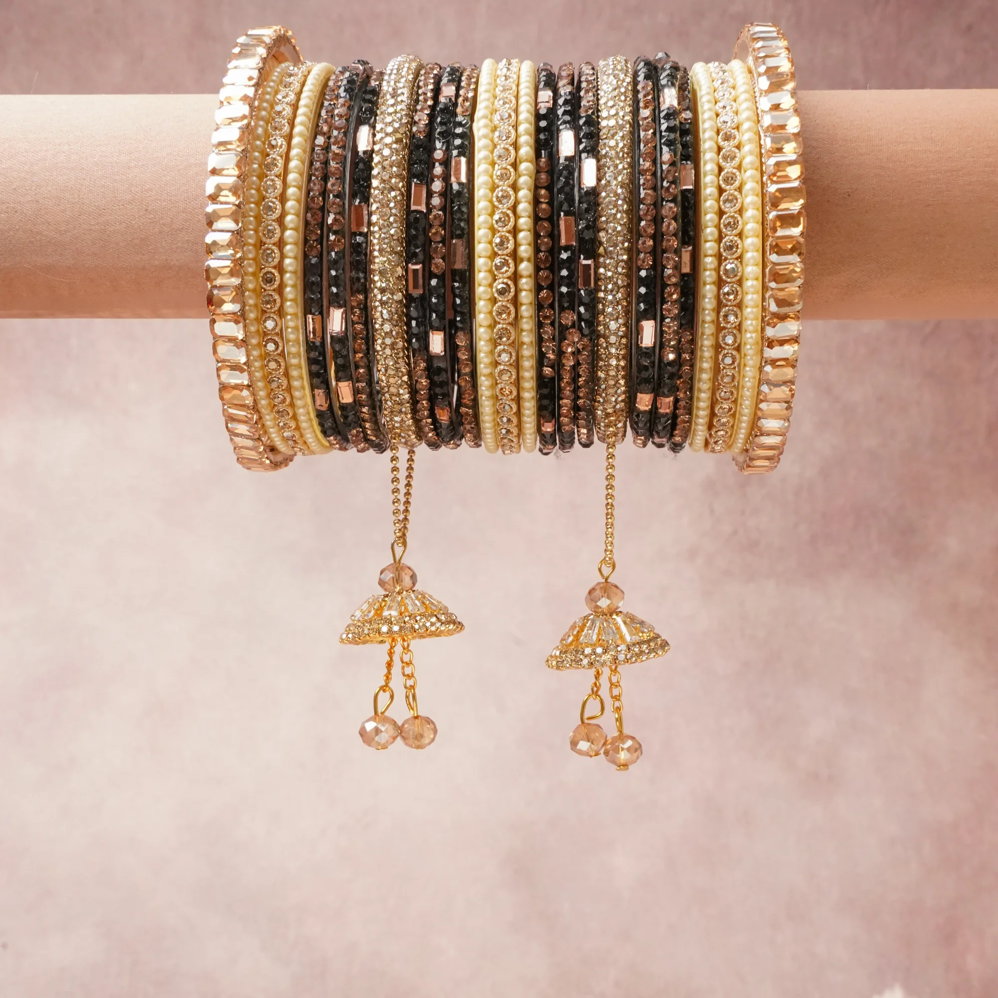 A commanding Black anchors this beautiful set, enriched with accents of Gold-tone, Rose Gold-tone, Champagne that add depth and dimension.

Featuring a striking composition of Metal Alloy, Faux Pearls, Glass, Crystals, this set carries intricate craftsmanship and strong presence. Grand in form, it is created for moments that deserve to be marked.